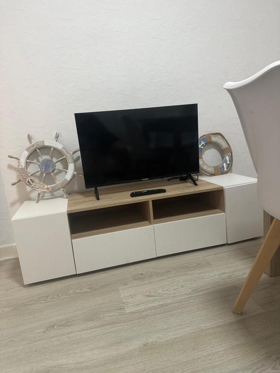 TV a/nebo společenská místnost v ubytování Raconet del mar