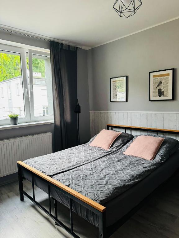 Postel nebo postele na pokoji v ubytování Apartamenty ToTuGdynia 7