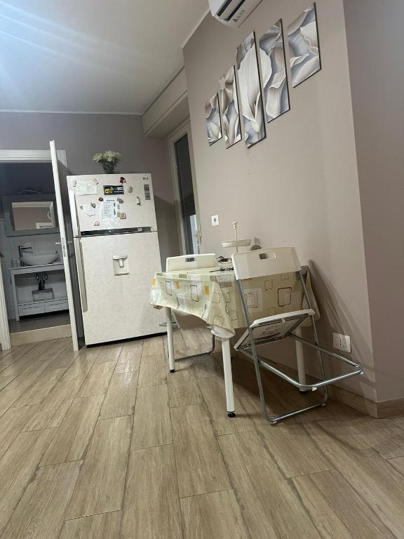 A kitchen or kitchenette at Tindaro Home