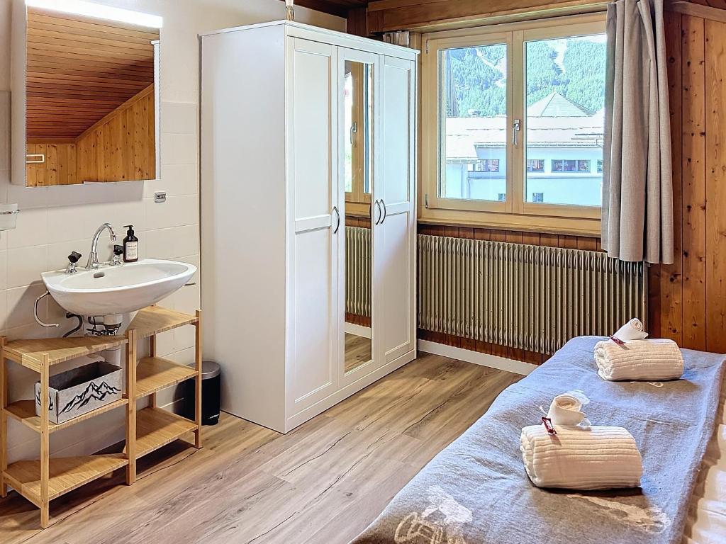 Postel nebo postele na pokoji v ubytování Appartement STERN - Confort au coeur de Saas-Fee