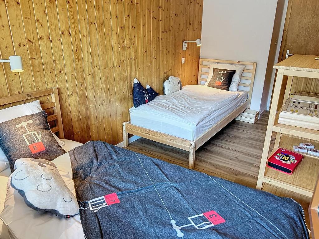 Postel nebo postele na pokoji v ubytování Appartement STERN - Confort au coeur de Saas-Fee