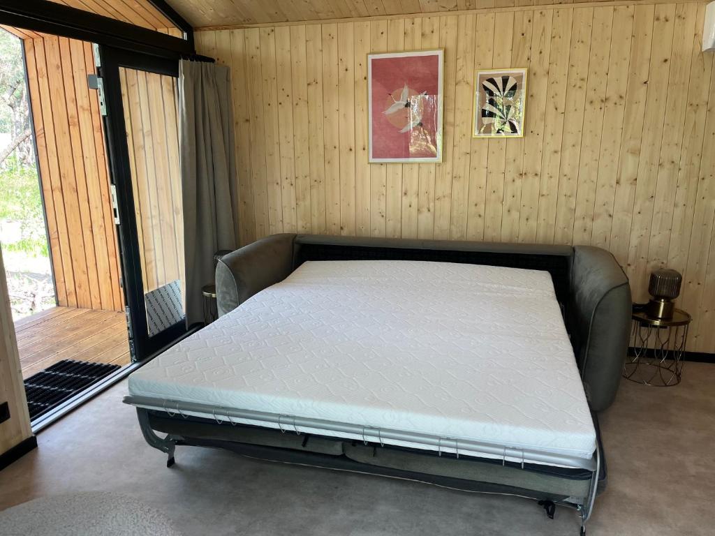 Postel nebo postele na pokoji v ubytování Hella