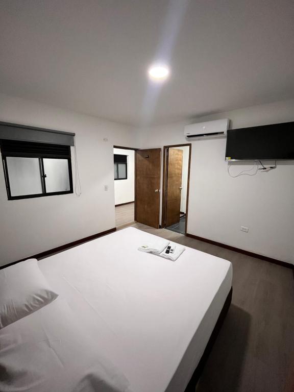 Postel nebo postele na pokoji v ubytování Hotel Gallery By 70