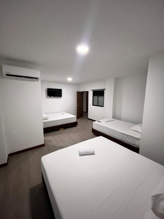 Postel nebo postele na pokoji v ubytování Hotel Gallery By 70
