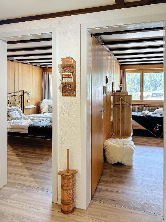 Postel nebo postele na pokoji v ubytování Appartement STERN - Confort au coeur de Saas-Fee