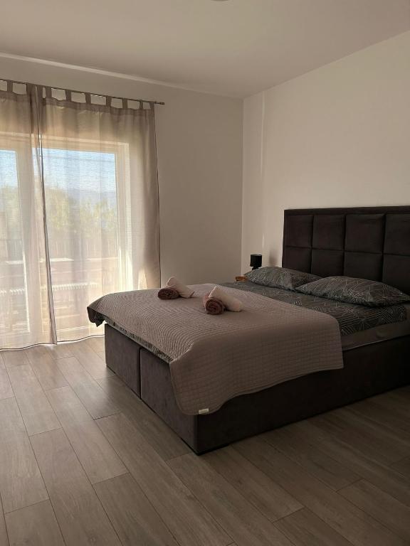 Posteľ alebo postele v izbe v ubytovaní Apartment Arbanija 1122a