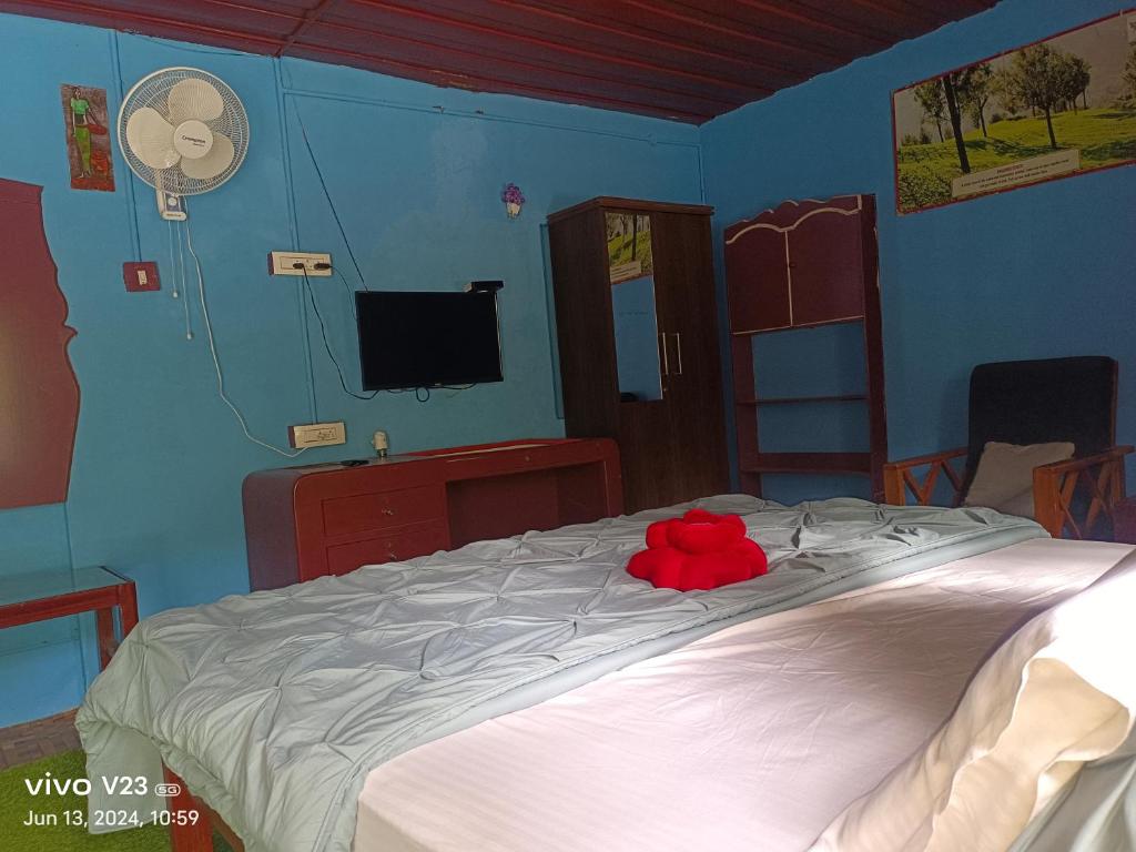 Postel nebo postele na pokoji v ubytování Munnar home stay