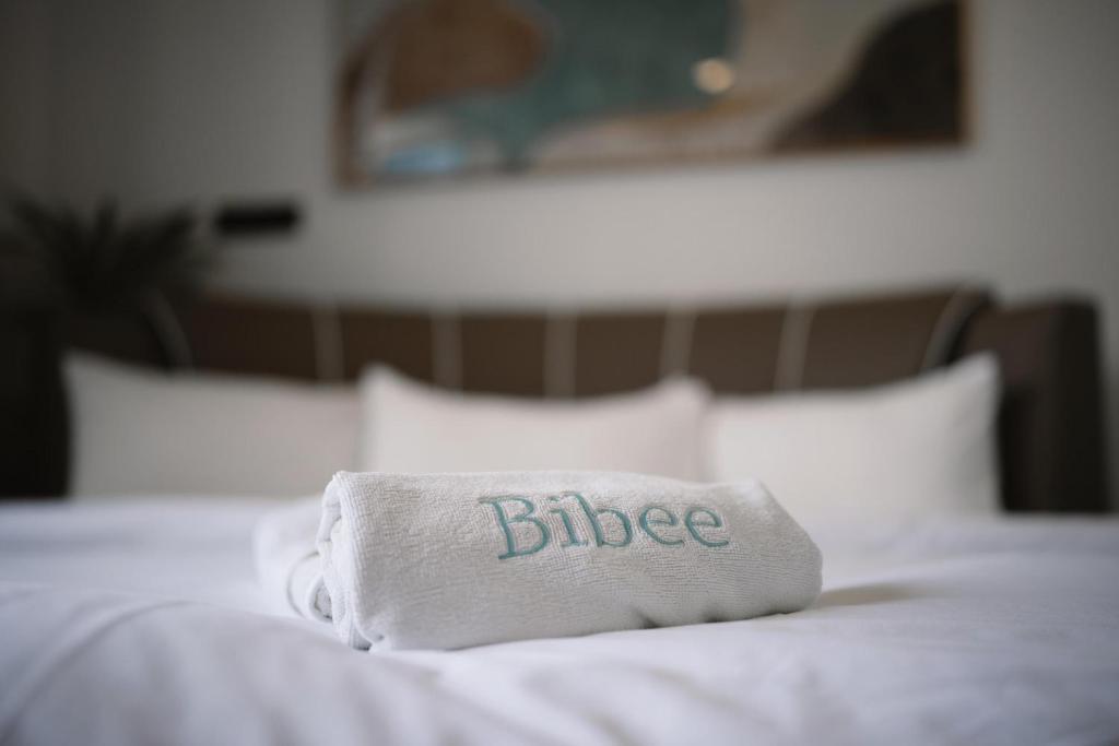 Postel nebo postele na pokoji v ubytování Bibee Maldives