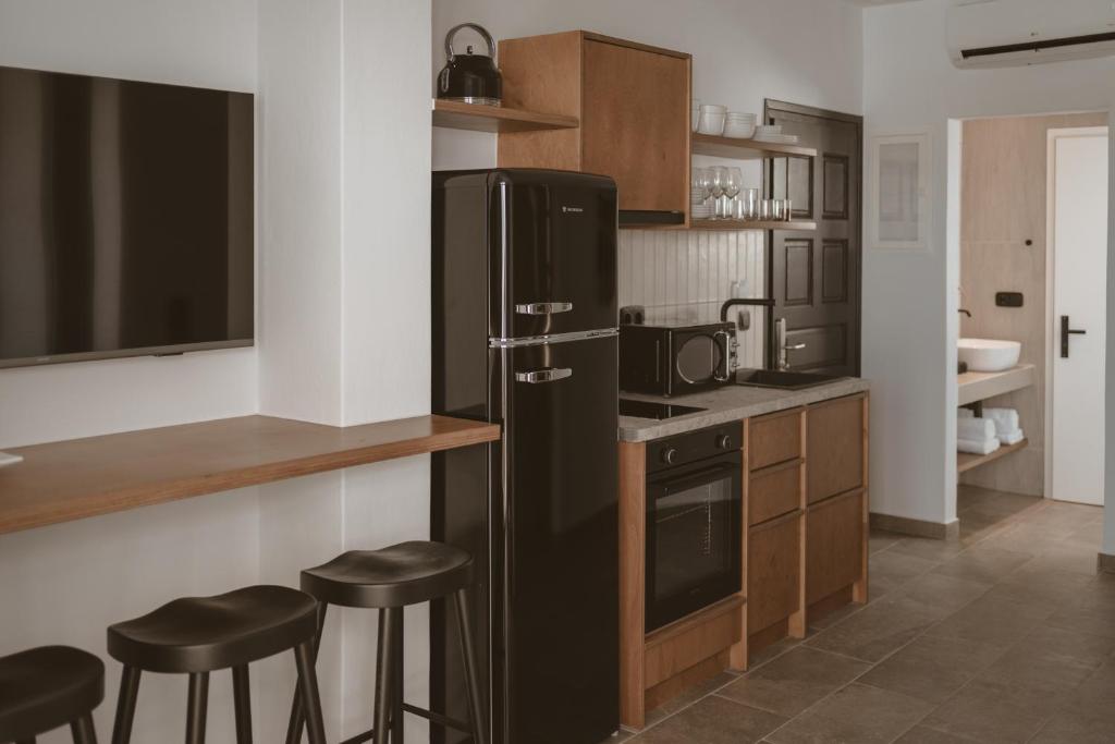 Kuchyň nebo kuchyňský kout v ubytování Kalea Luxury Villas