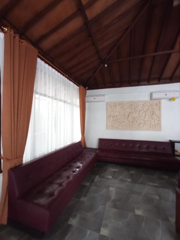Posezení v ubytování Kampoeng Joglo Abangan Ubud