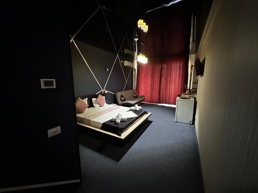 Postel nebo postele na pokoji v ubytování Hotel Sweet
