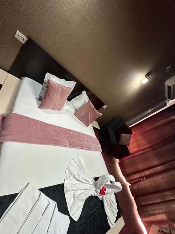 Postel nebo postele na pokoji v ubytování Hotel Sweet