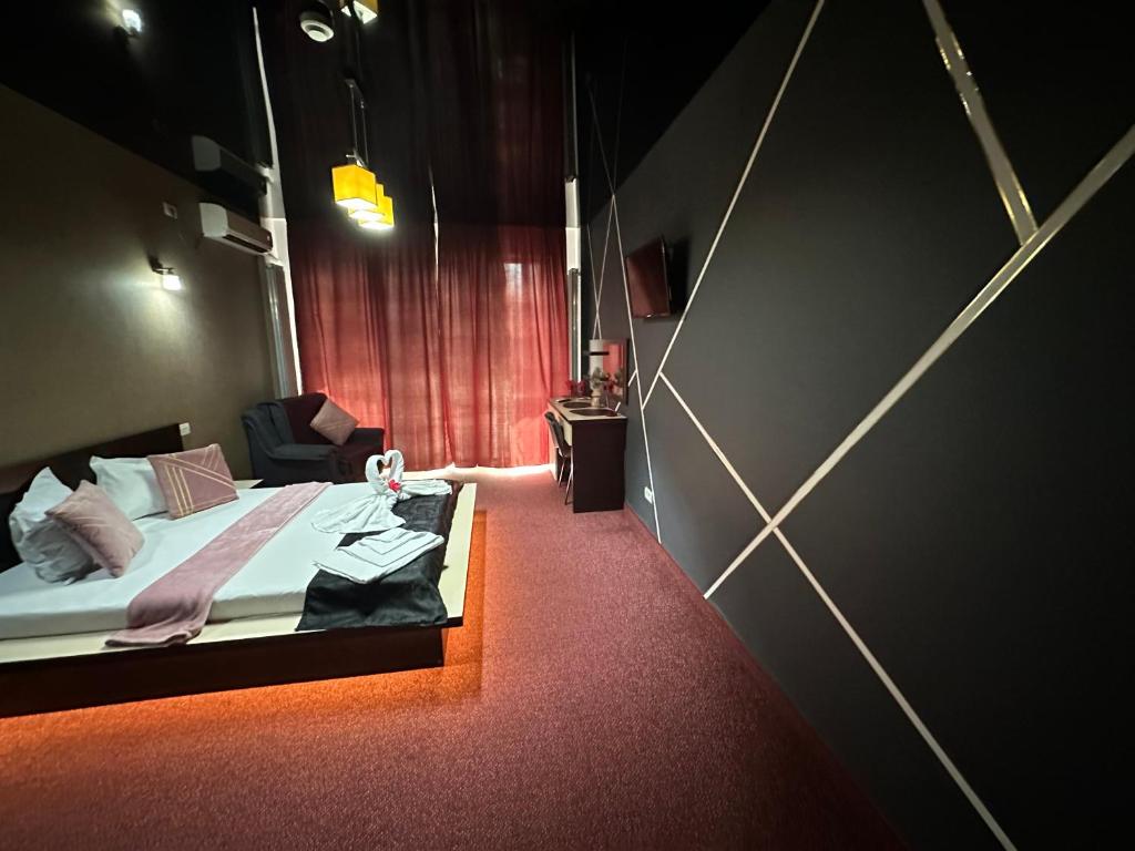 Postel nebo postele na pokoji v ubytování Hotel Sweet