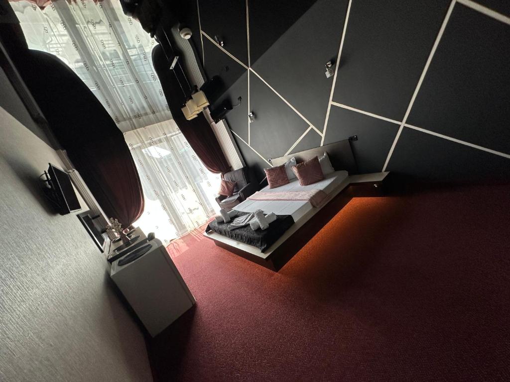Postel nebo postele na pokoji v ubytování Hotel Sweet