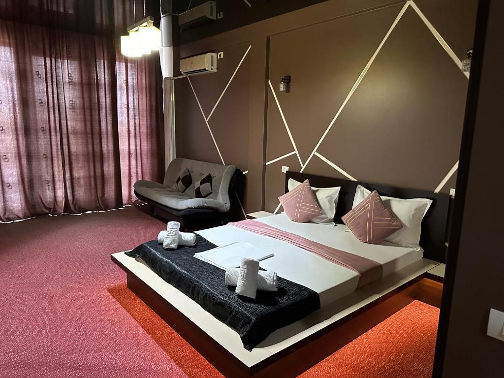 Postel nebo postele na pokoji v ubytování Hotel Sweet