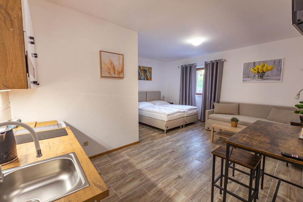 Postel nebo postele na pokoji v ubytování Country Saloon