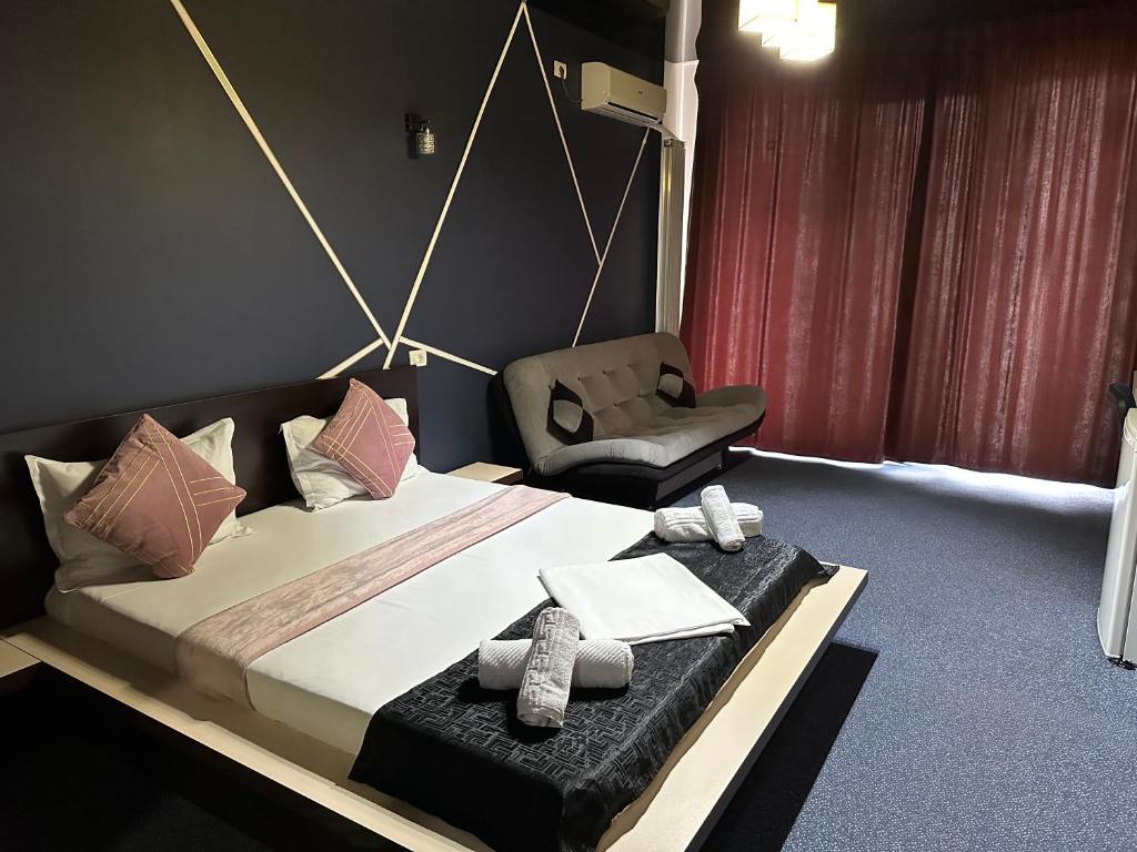 Postel nebo postele na pokoji v ubytování Hotel Sweet