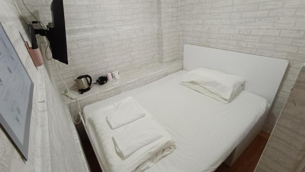 Postel nebo postele na pokoji v ubytování Cozy Inn Jordan Station