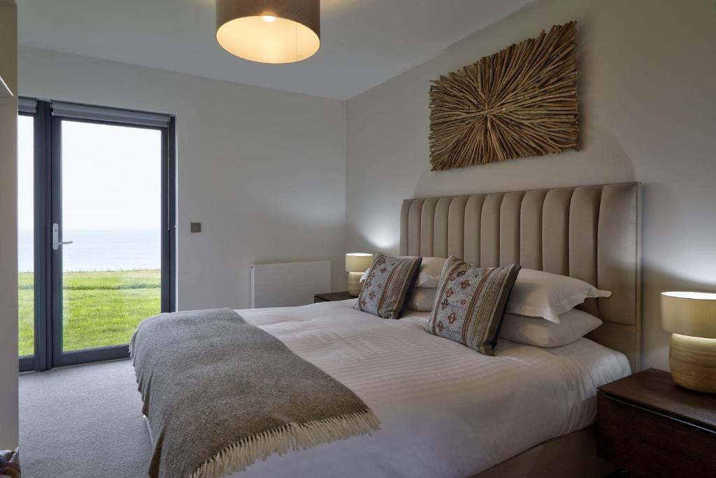 Postel nebo postele na pokoji v ubytování Cottage 17 - 3 Bed