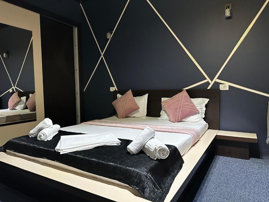 Postel nebo postele na pokoji v ubytování Hotel Sweet