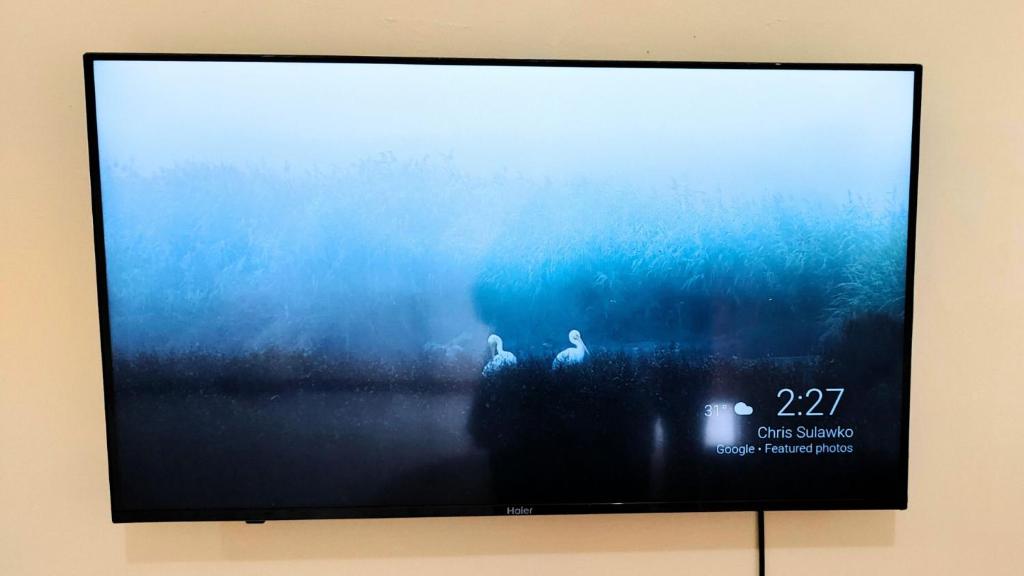 TV a/nebo společenská místnost v ubytování Cogon Gate 1