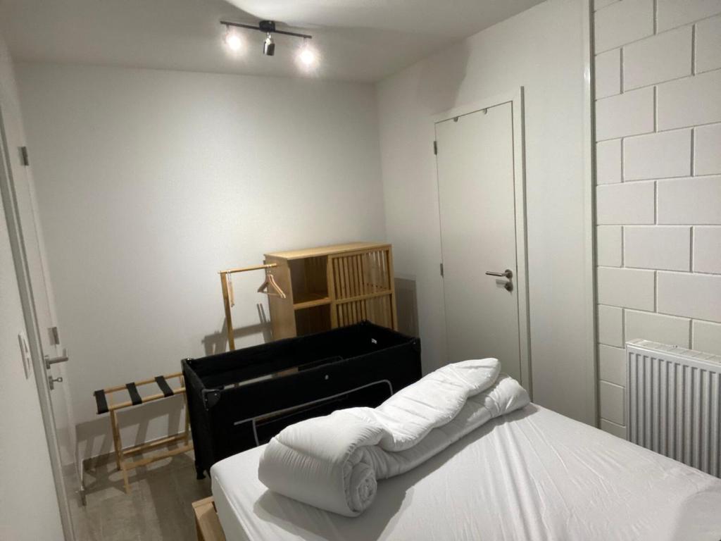 Postel nebo postele na pokoji v ubytování Le P'tit Padré
