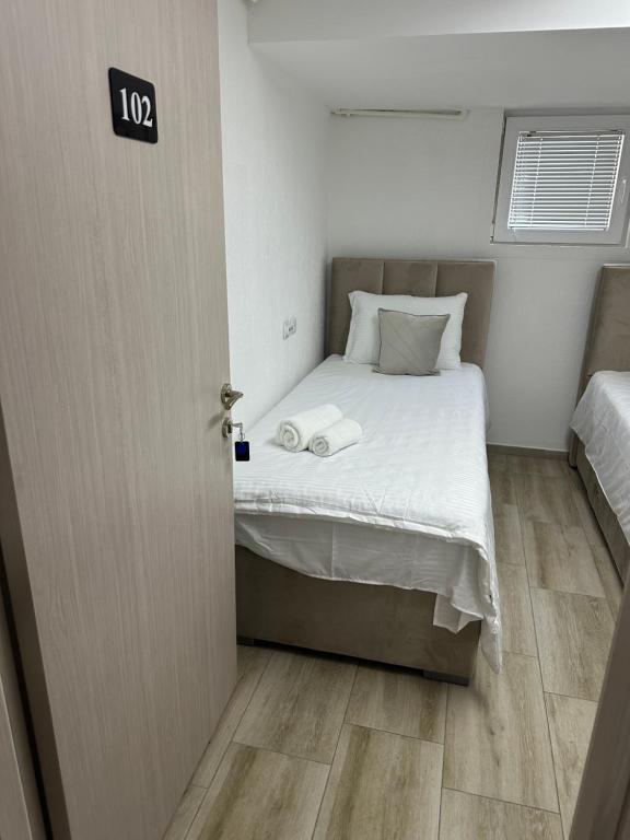 Postel nebo postele na pokoji v ubytování Next Rooms