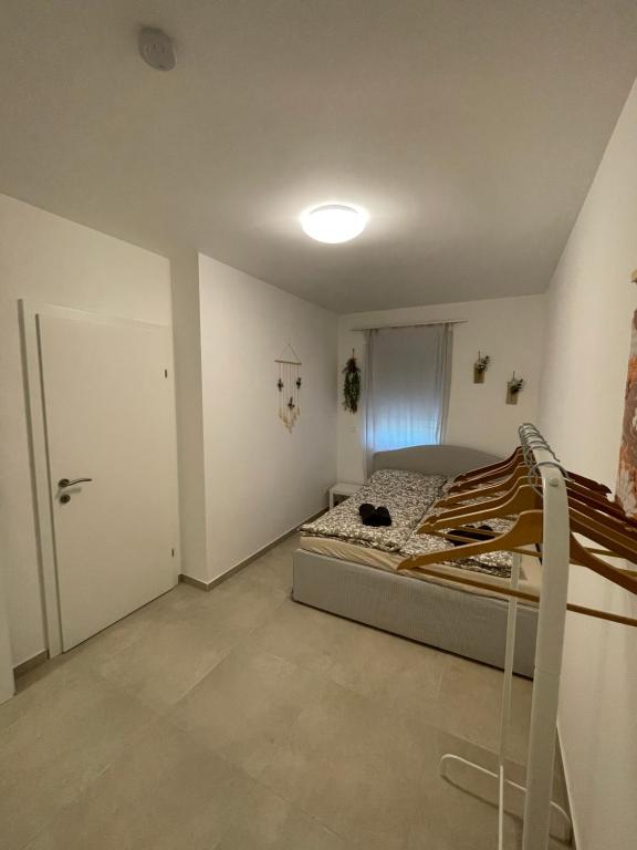 Postel nebo postele na pokoji v ubytování Langenzersdorf Apartment