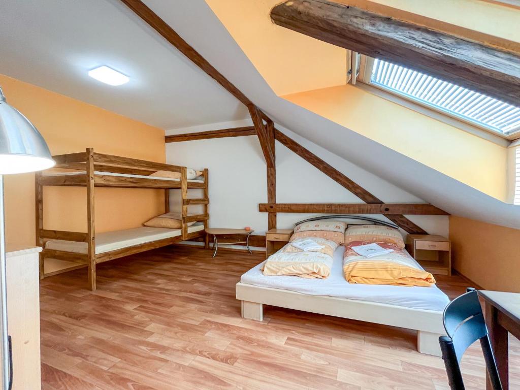 Postel nebo postele na pokoji v ubytování Penzion U Fandy