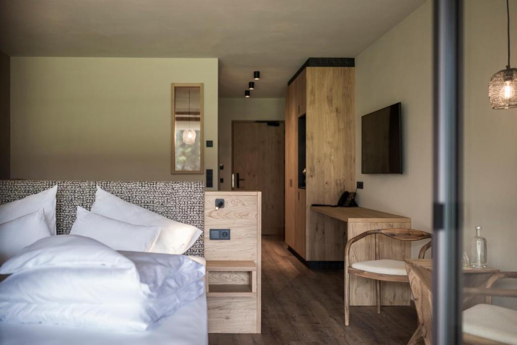 Postel nebo postele na pokoji v ubytování Hotel Patris