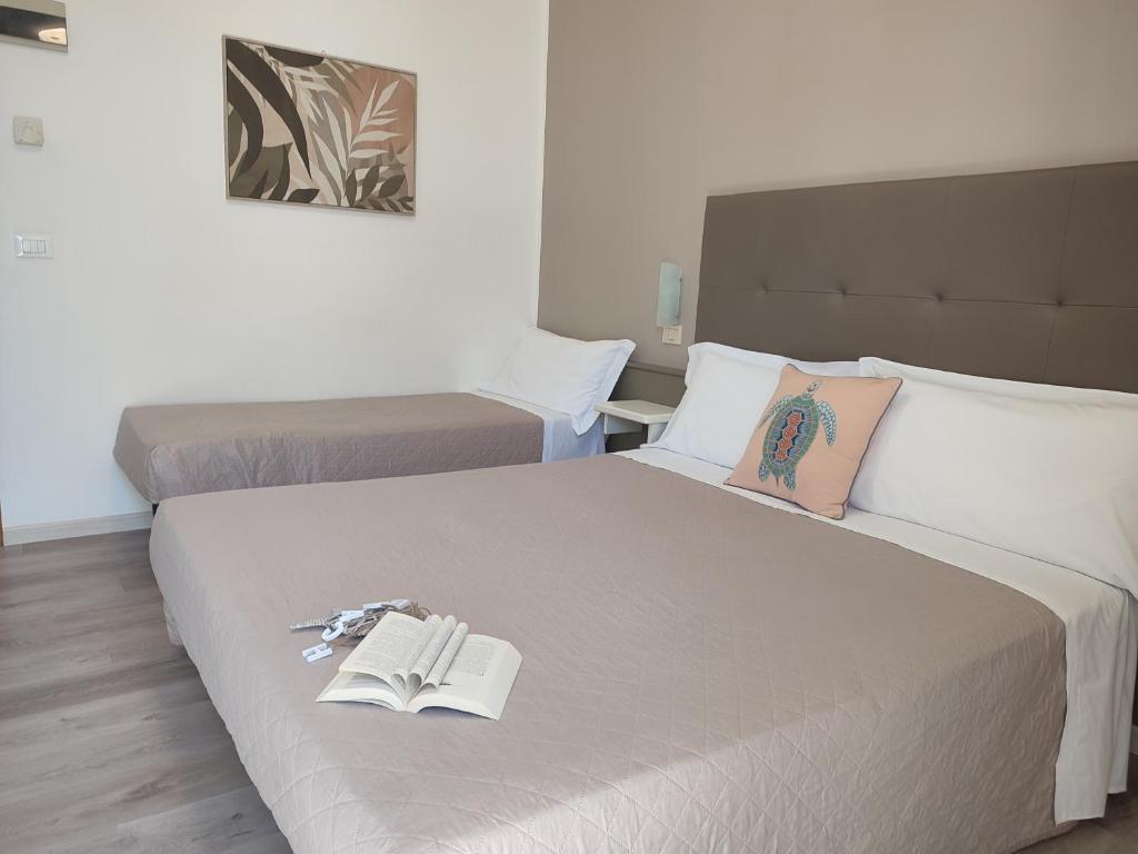 Postel nebo postele na pokoji v ubytování Hotel Madera