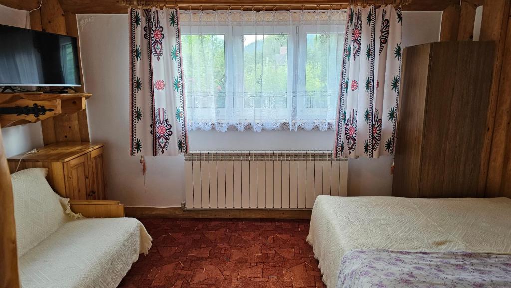 Posteľ alebo postele v izbe v ubytovaní Willa Józefina