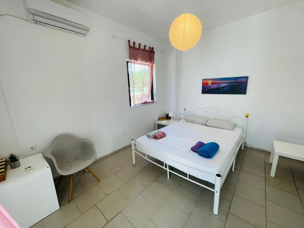 Postel nebo postele na pokoji v ubytování akrata siesta