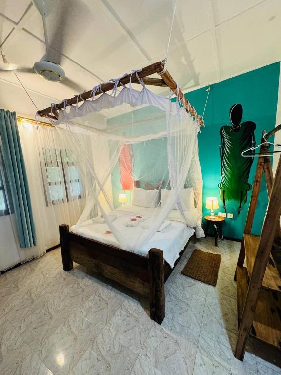 Voodi või voodid majutusasutuse Babalao Bungalows toas