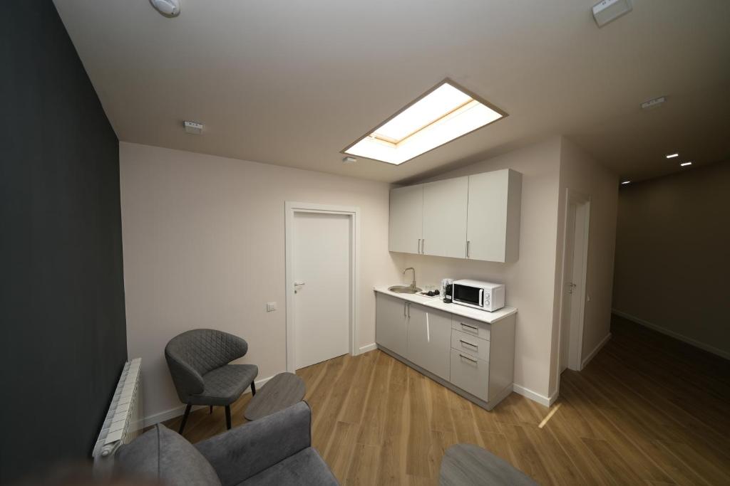 Kuchyň nebo kuchyňský kout v ubytování Ser In Hotel