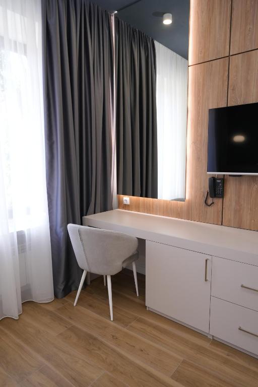 TV a/nebo společenská místnost v ubytování Ser In Hotel