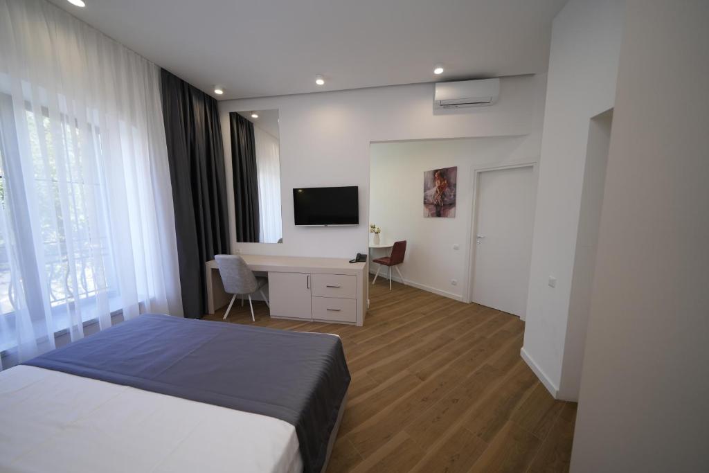 Postel nebo postele na pokoji v ubytování Ser In Hotel