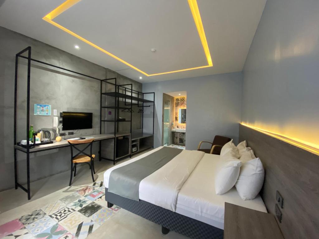 TV a/nebo společenská místnost v ubytování Zenvea Hotel