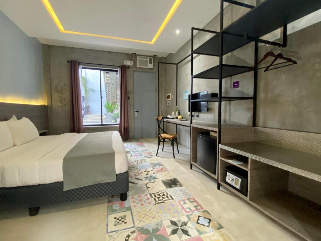 Postel nebo postele na pokoji v ubytování Zenvea Hotel
