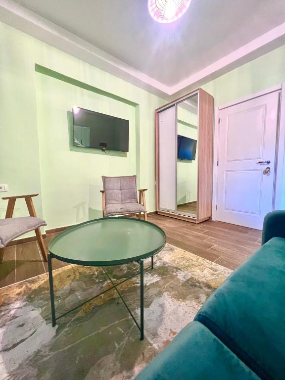 TV a/nebo společenská místnost v ubytování Floridas Beach Suites
