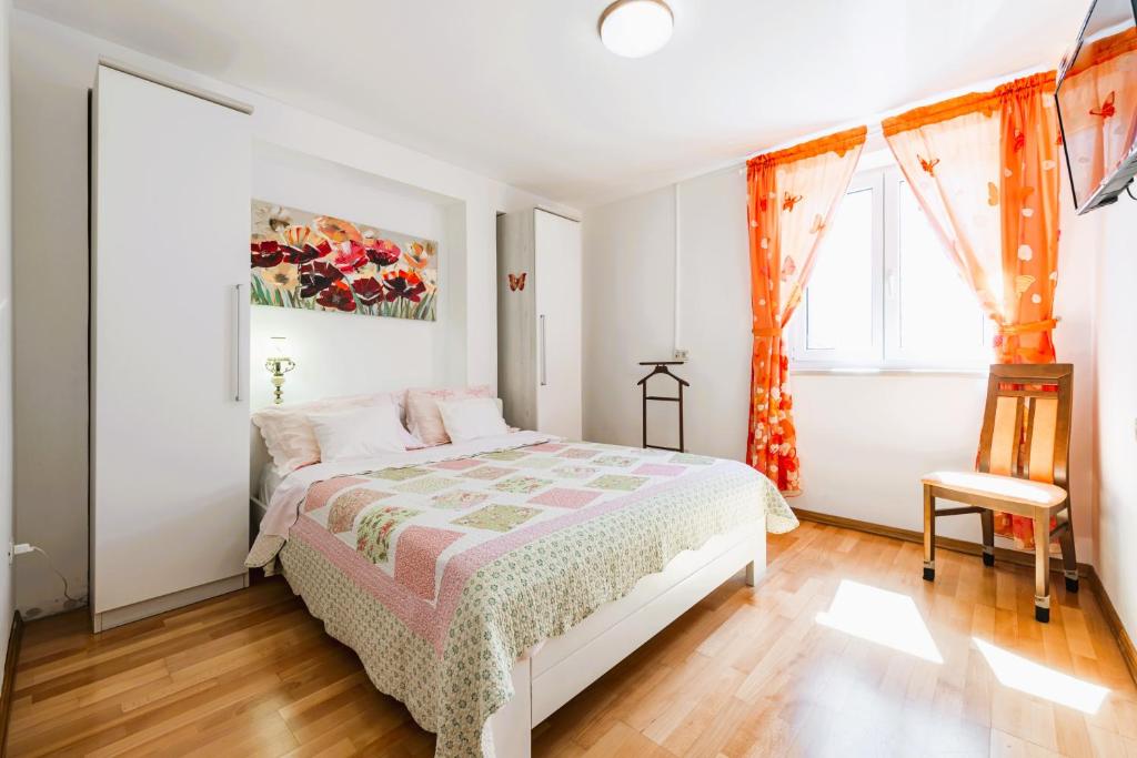 Postel nebo postele na pokoji v ubytování Uvala Apartment