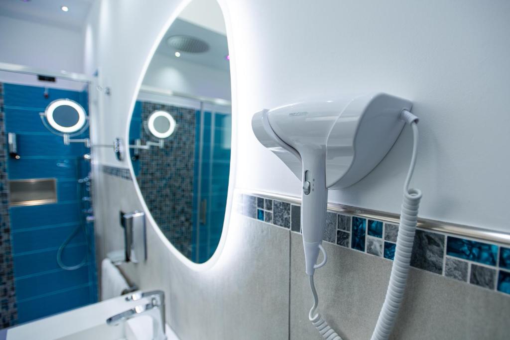 Koupelna v ubytování Hotel Blu Eden