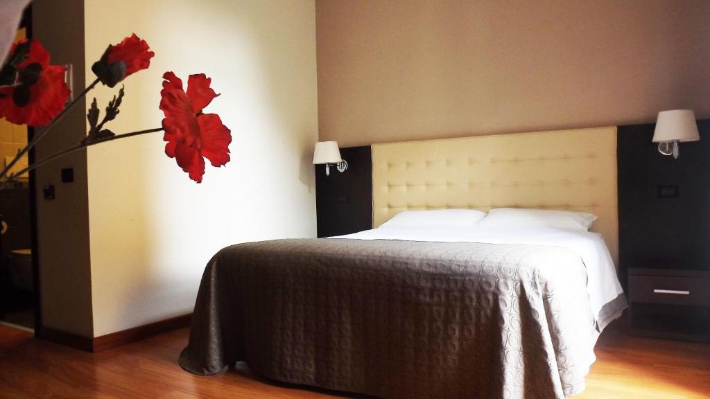 Posteľ alebo postele v izbe v ubytovaní Hotel Nautilus