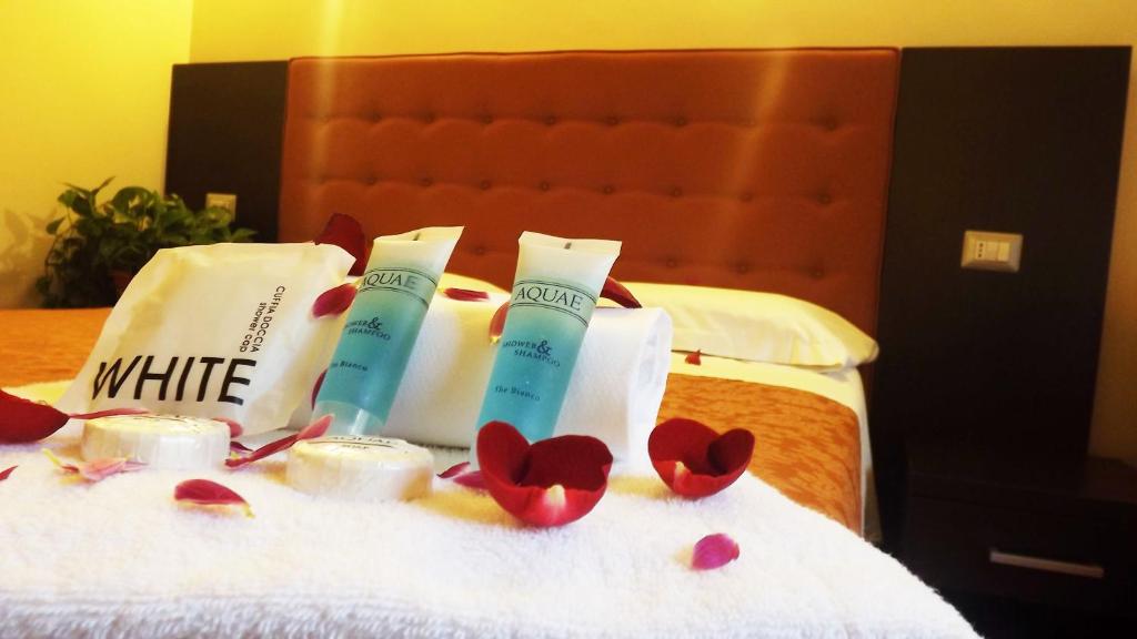 Posteľ alebo postele v izbe v ubytovaní Hotel Nautilus