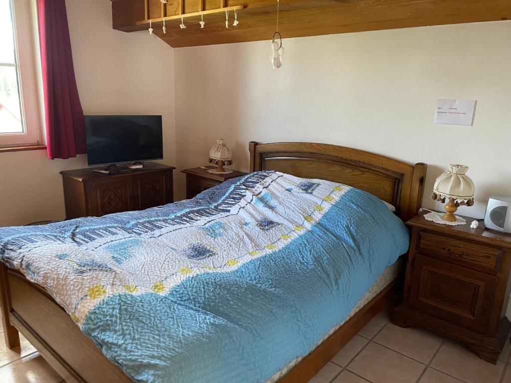 Postel nebo postele na pokoji v ubytování Chambres d'hôtes