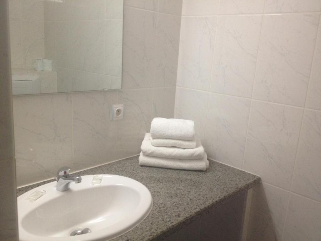 Koupelna v ubytování Hotel Le Strasbourg