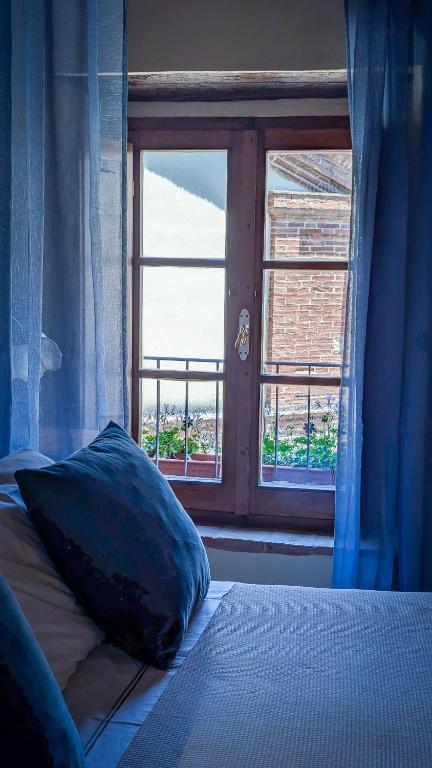 Postel nebo postele na pokoji v ubytování Pienzalettings "Suites"