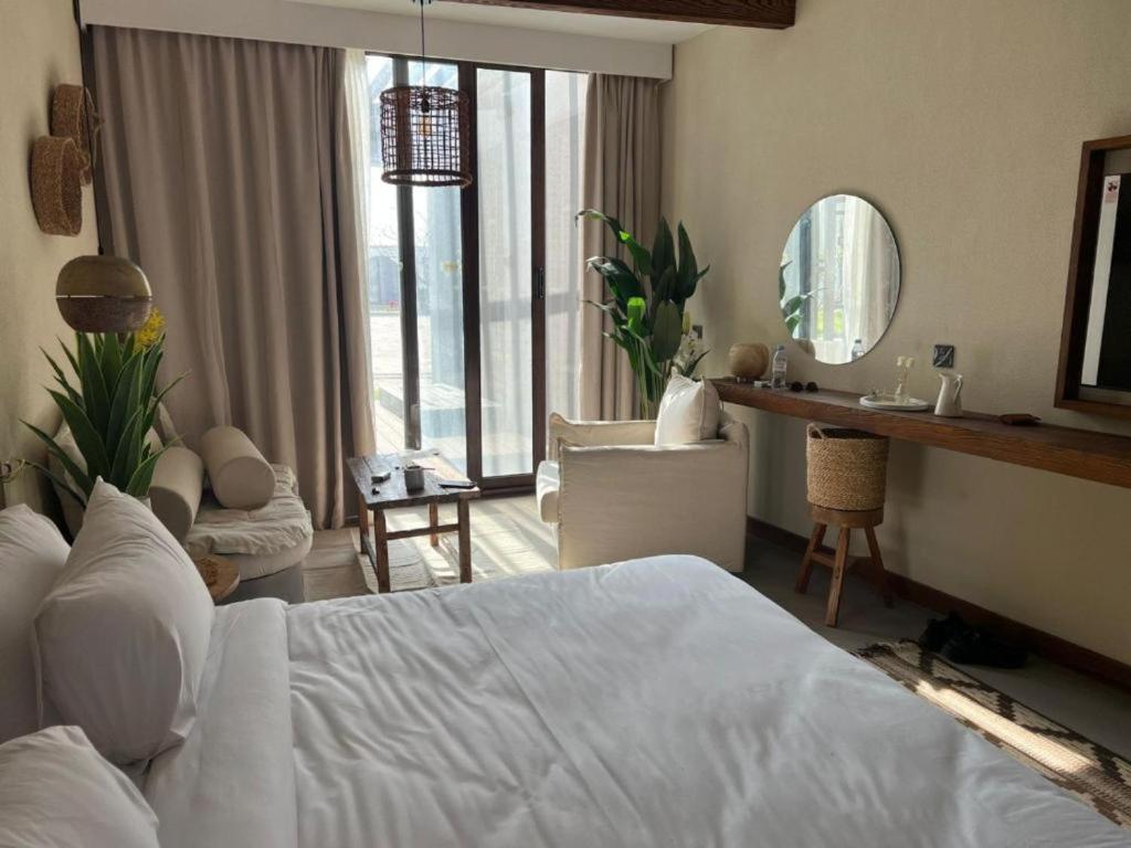 En eller flere senger på et rom på Le Sidi Cabanas hotel serviced