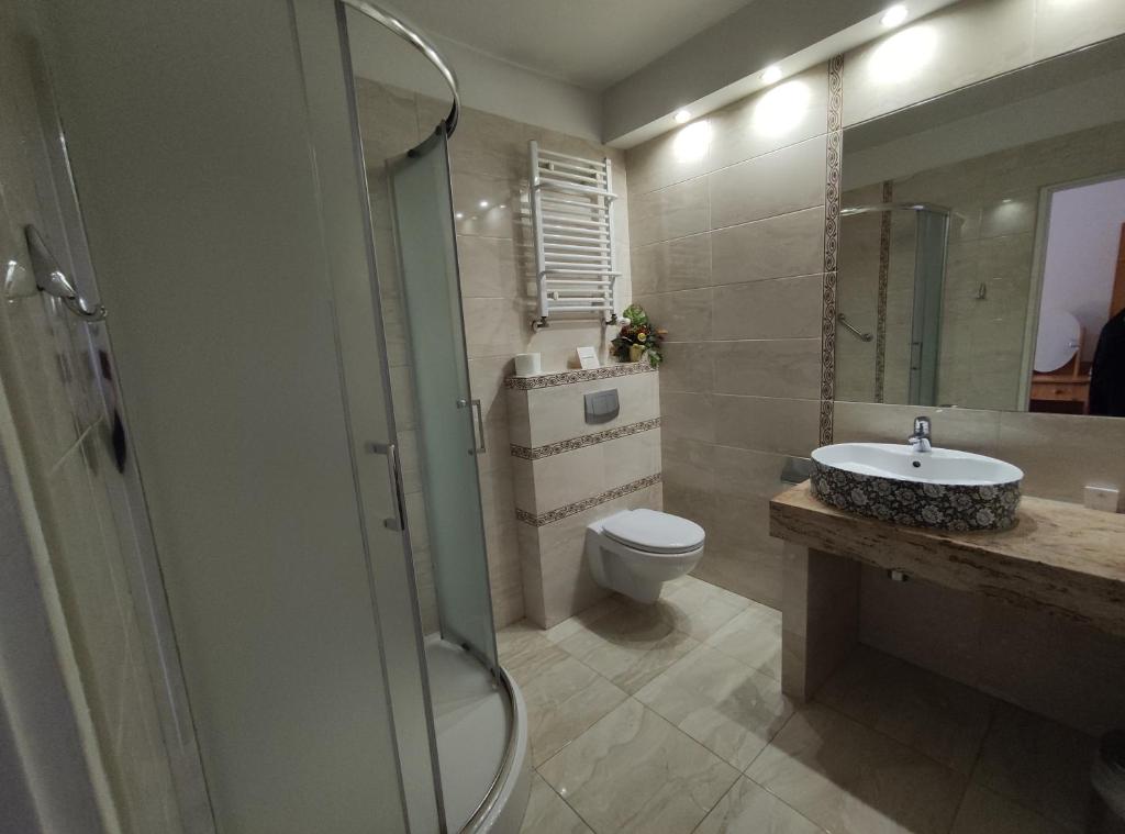 Koupelna v ubytování Hotel Atena