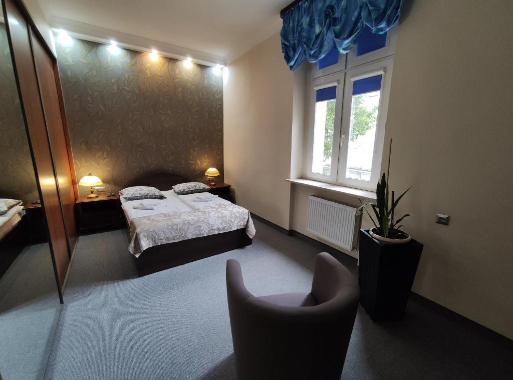 Postel nebo postele na pokoji v ubytování Hotel Atena